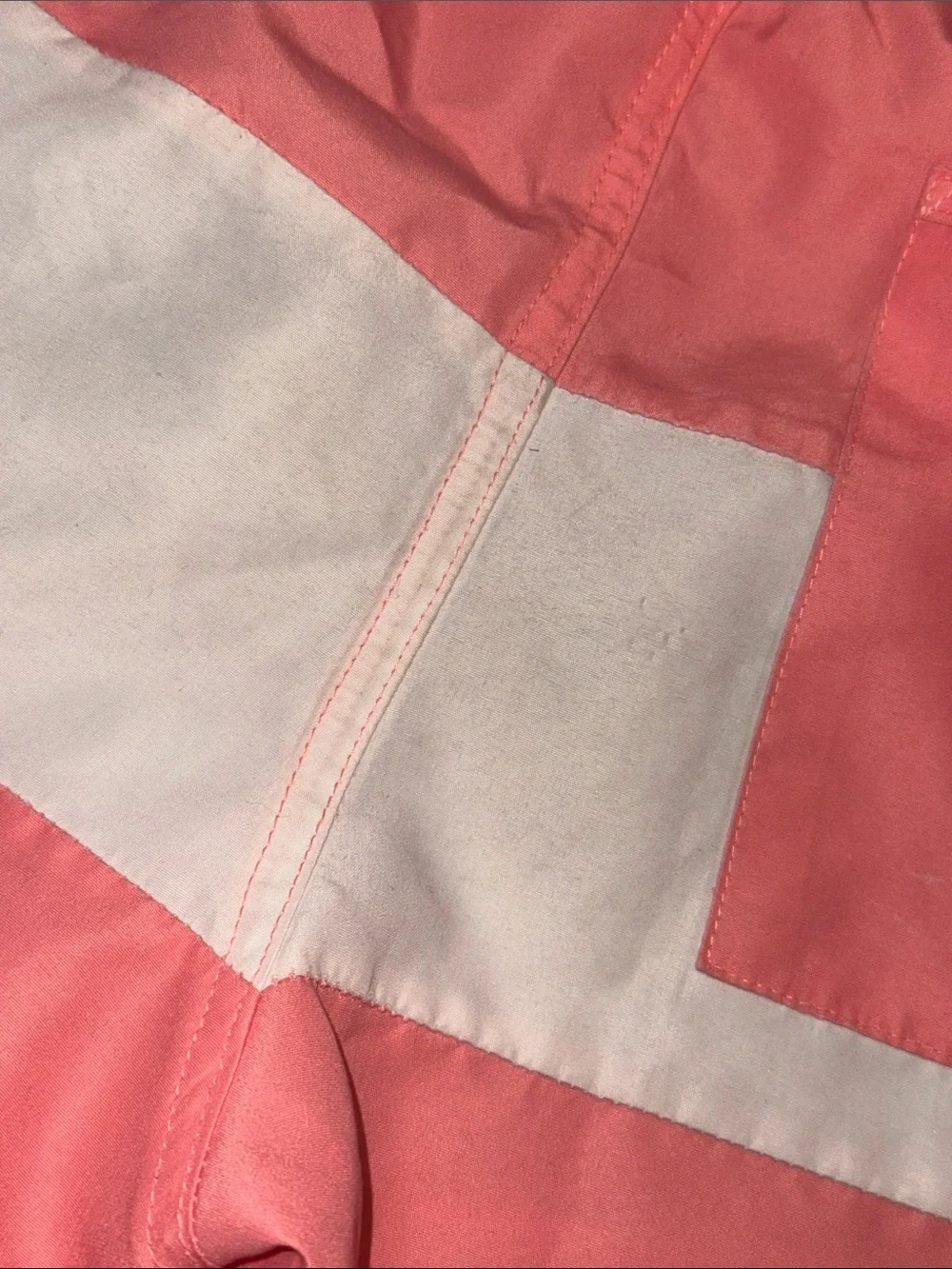 Minnow color block boardie Coral & White Stripe. Size 9/10. Good condition.